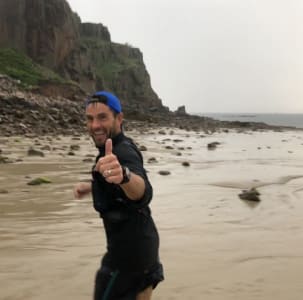 Bryan running on the beach